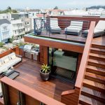 Idromassaggio ad angolo per piattaforma di legno teak