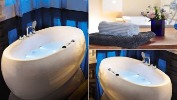 Bagno spa con vasca idromassaggio di forma ovale